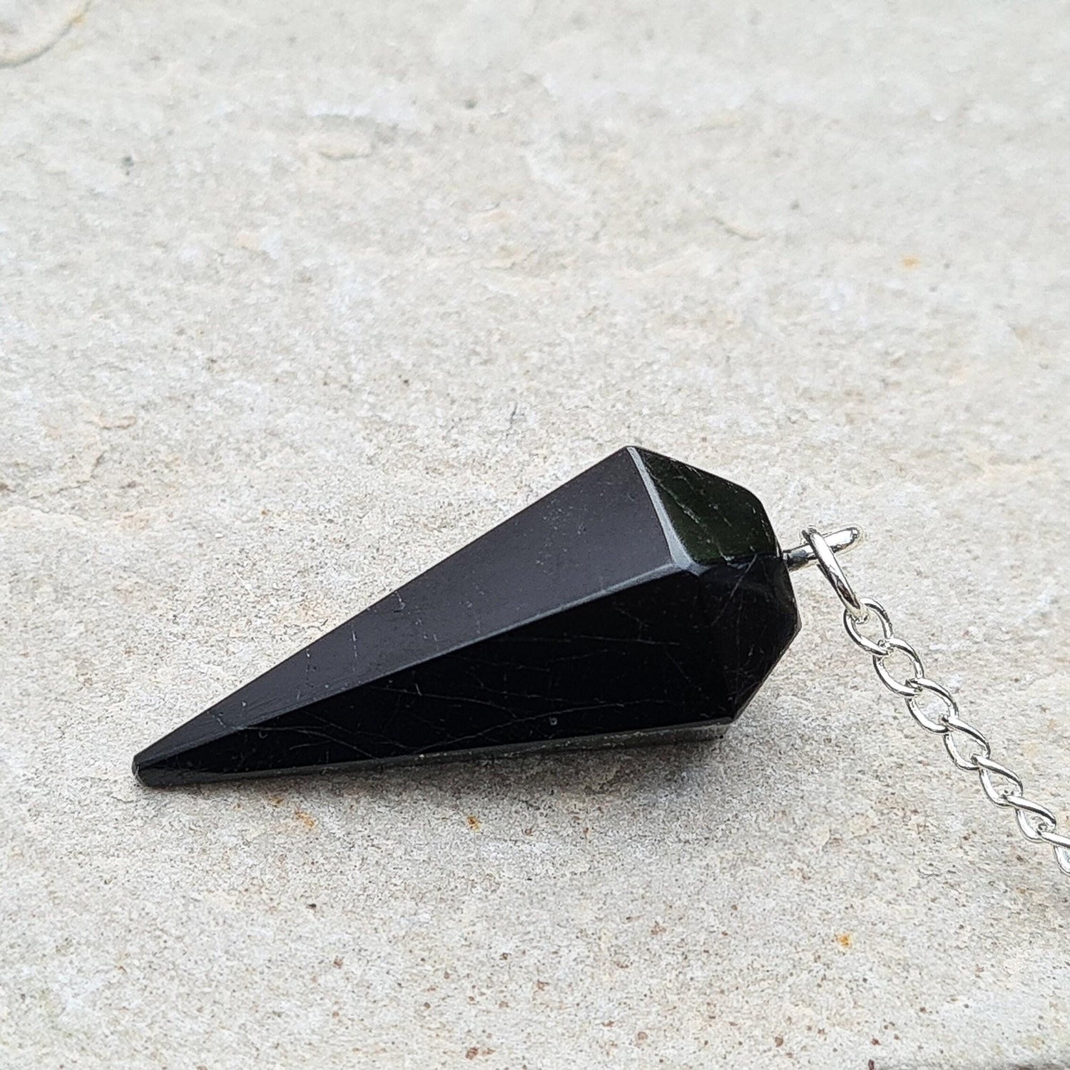 Black Tourmaline Crystal Pendulum. Will come in a box or pouch to keep it in. Also known as Schorl. From Brazil.