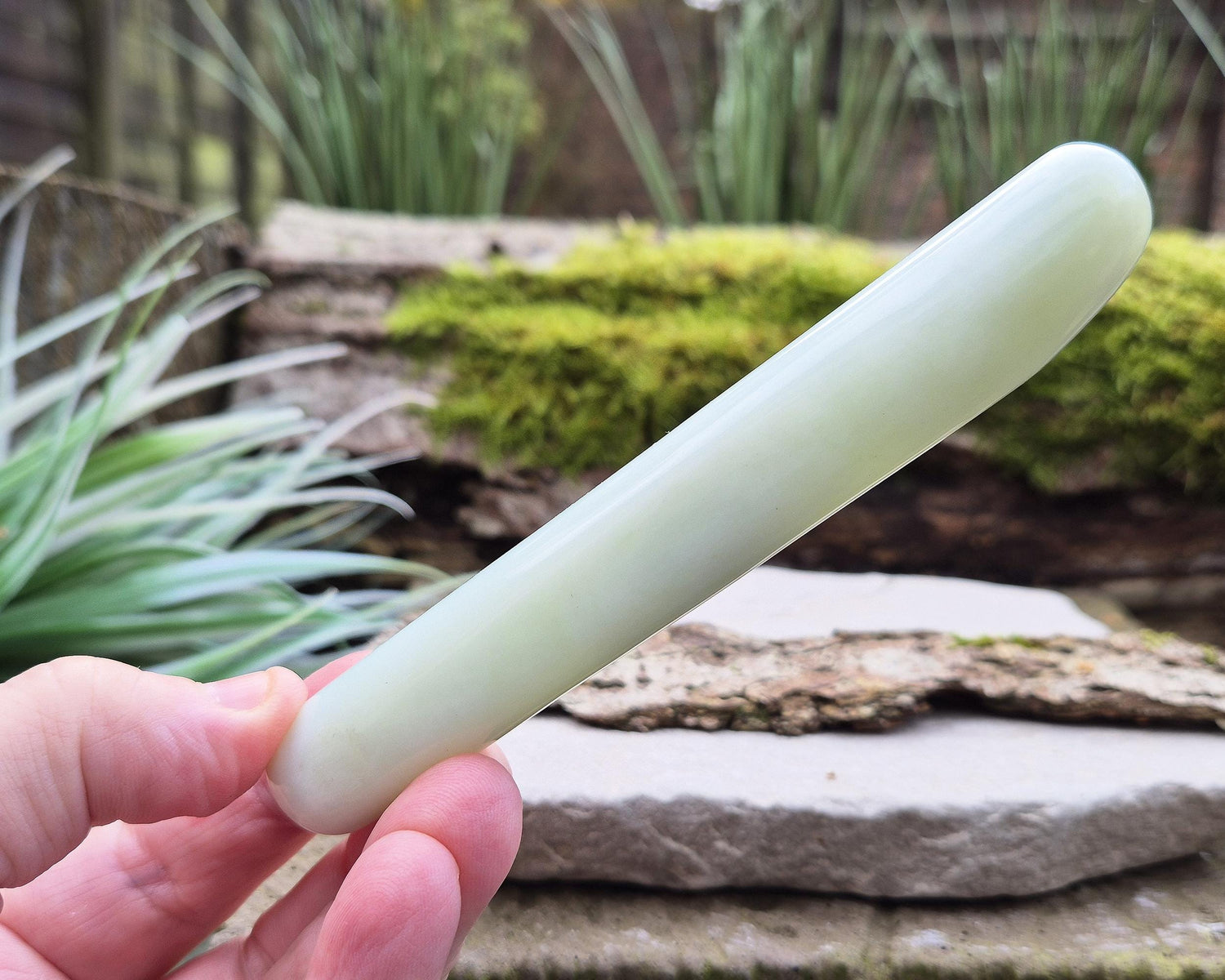 Serpentine Crystal Wand, smooth rounded ends, and a pale green colour. Often refered to as New Jade. From China.