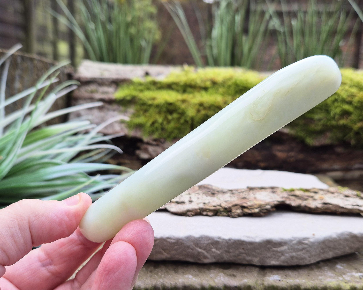 Serpentine Crystal Wand, smooth rounded ends, and a pale green colour. Often refered to as New Jade. From China.