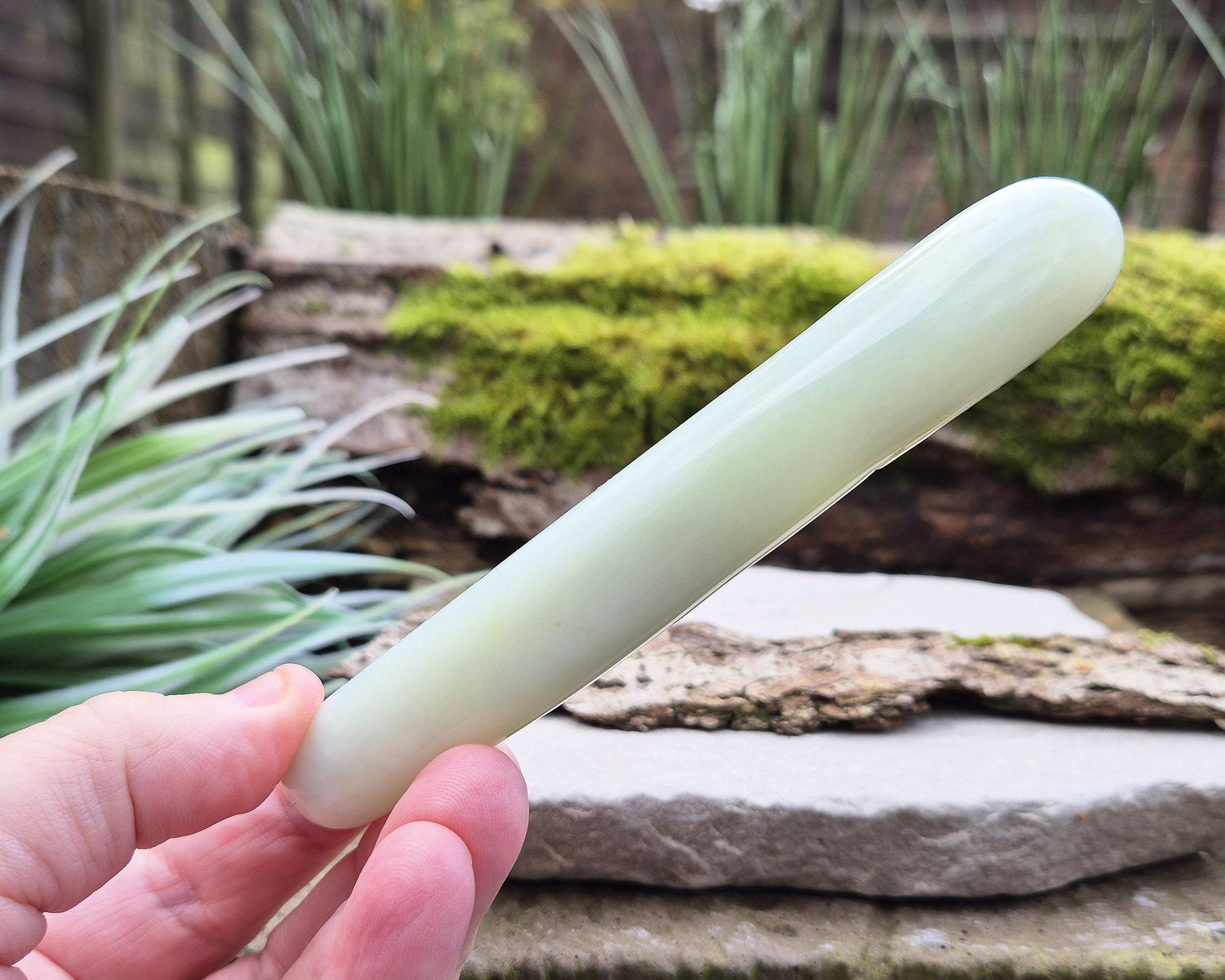 Serpentine Crystal Wand, smooth rounded ends, and a pale green colour. Often refered to as New Jade. From China.