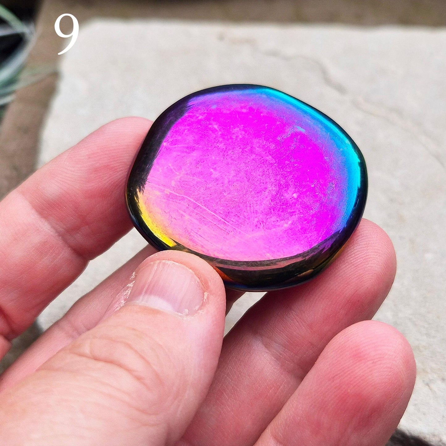 Titanium Aura Obsidian Palm Stone, also known as Rainbow Aura, Mystic Obsidian, Flame Aura, and Dark Rainbow Aura. The Obsidian is from Mexico. 