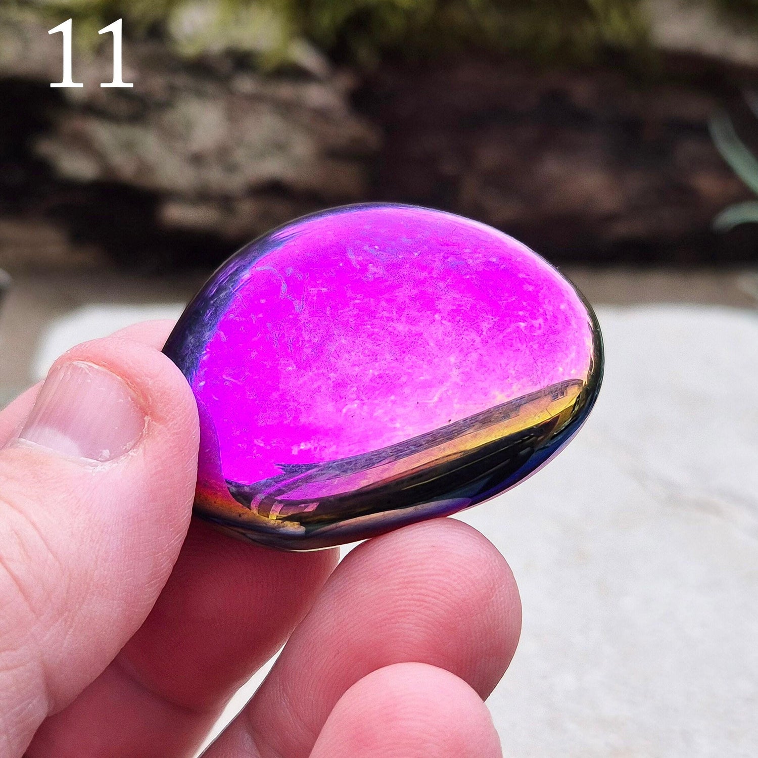 Titanium Aura Obsidian Palm Stone, also known as Rainbow Aura, Mystic Obsidian, Flame Aura, and Dark Rainbow Aura. The Obsidian is from Mexico. 