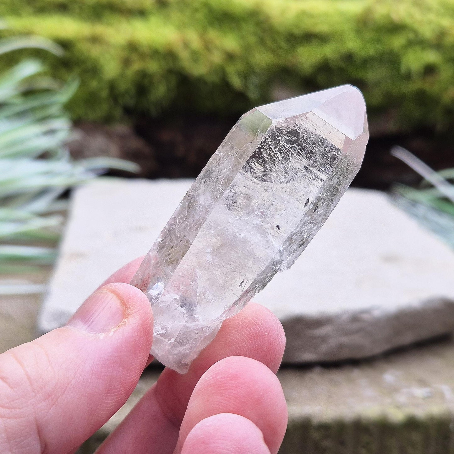 Starbrary Quartz Crystal Point From Brazil. This crystal is a point has nice clarity and lovely Starbrary markings on at least 2 sides.