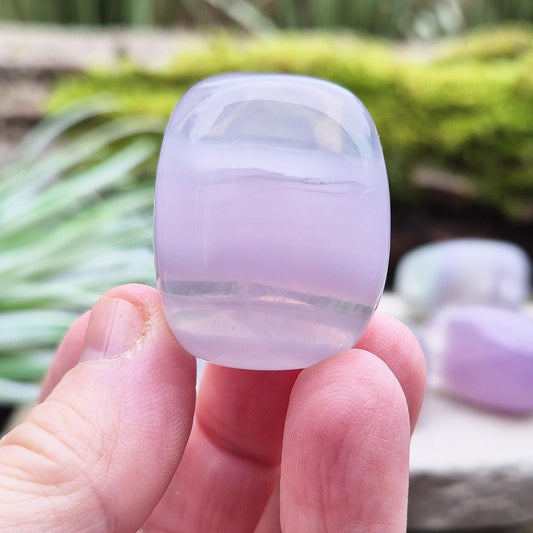 Lilac Fluorite Crystal. Lilac Fluorite also known as Lavender Fluorite is often described as a "balancing bridge" between the heart and the higher mind, offering a soothing energy that aids both emotional and spiritual harmony.