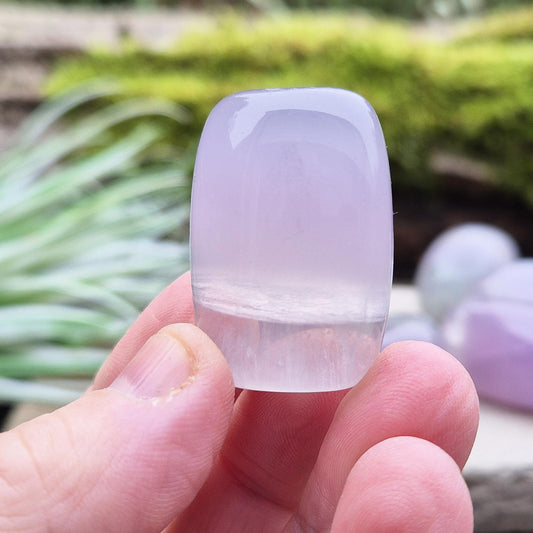 Lilac Fluorite Crystal. Lilac Fluorite also known as Lavender Fluorite is often described as a "balancing bridge" between the heart and the higher mind, offering a soothing energy that aids both emotional and spiritual harmony.