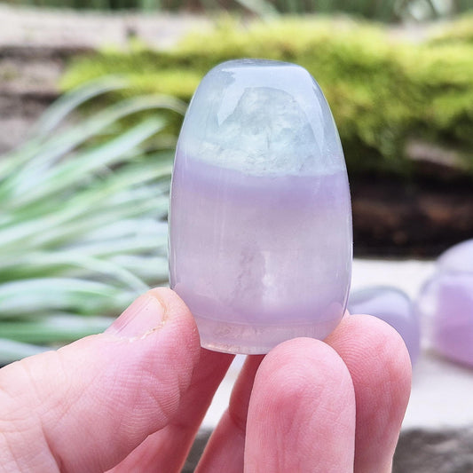 Lilac Fluorite Crystal. Lilac Fluorite also known as Lavender Fluorite is often described as a "balancing bridge" between the heart and the higher mind, offering a soothing energy that aids both emotional and spiritual harmony.