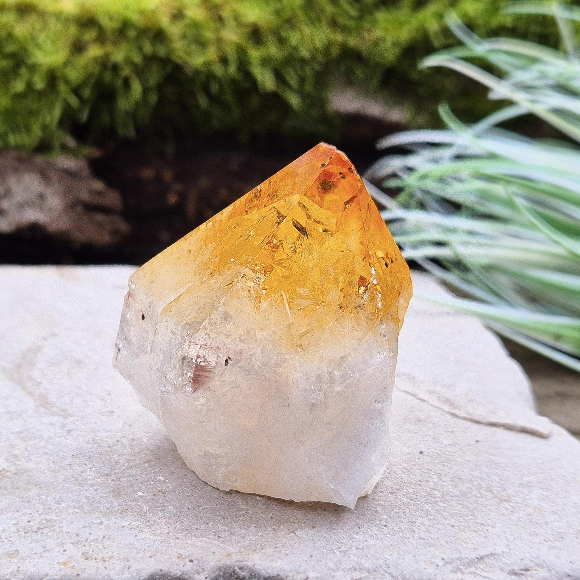 This crystal point offers an authentic, natural touch to any collection. Citrine is often appreciated for its bright, uplifting energy and is associated with clarity, motivation, and a positive outlook.