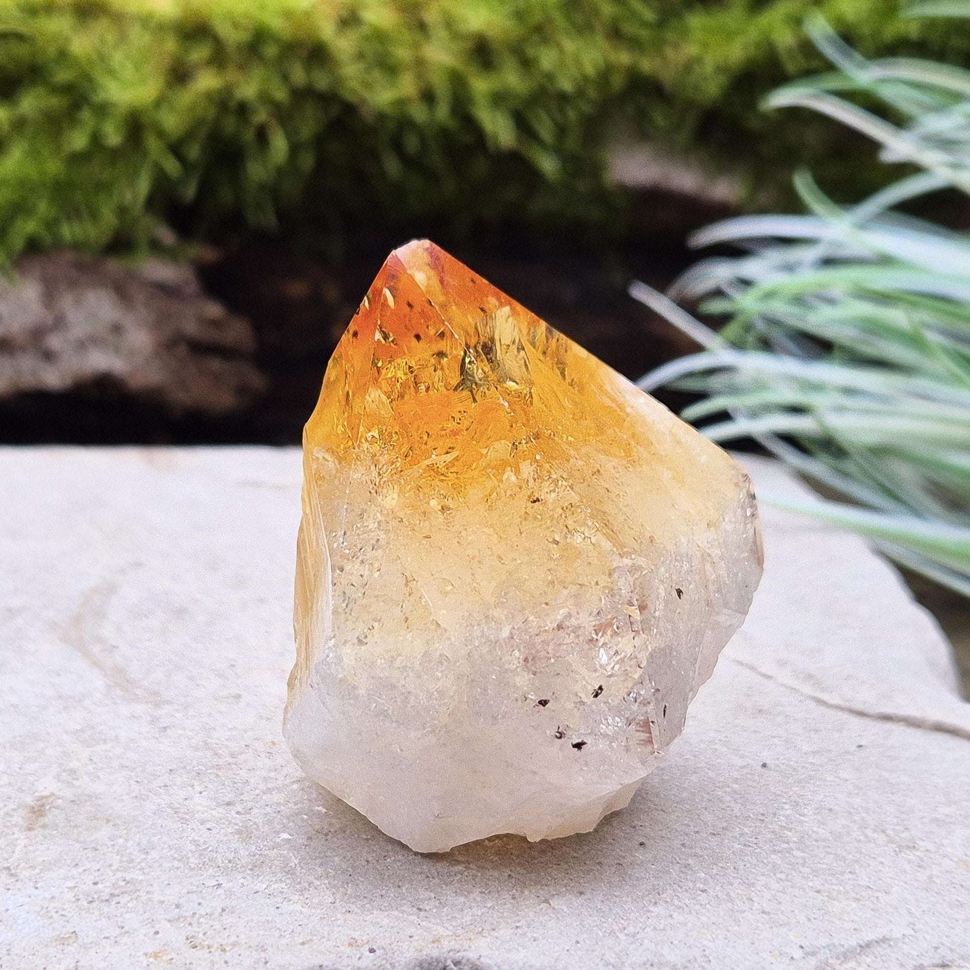 This crystal point offers an authentic, natural touch to any collection. Citrine is often appreciated for its bright, uplifting energy and is associated with clarity, motivation, and a positive outlook.