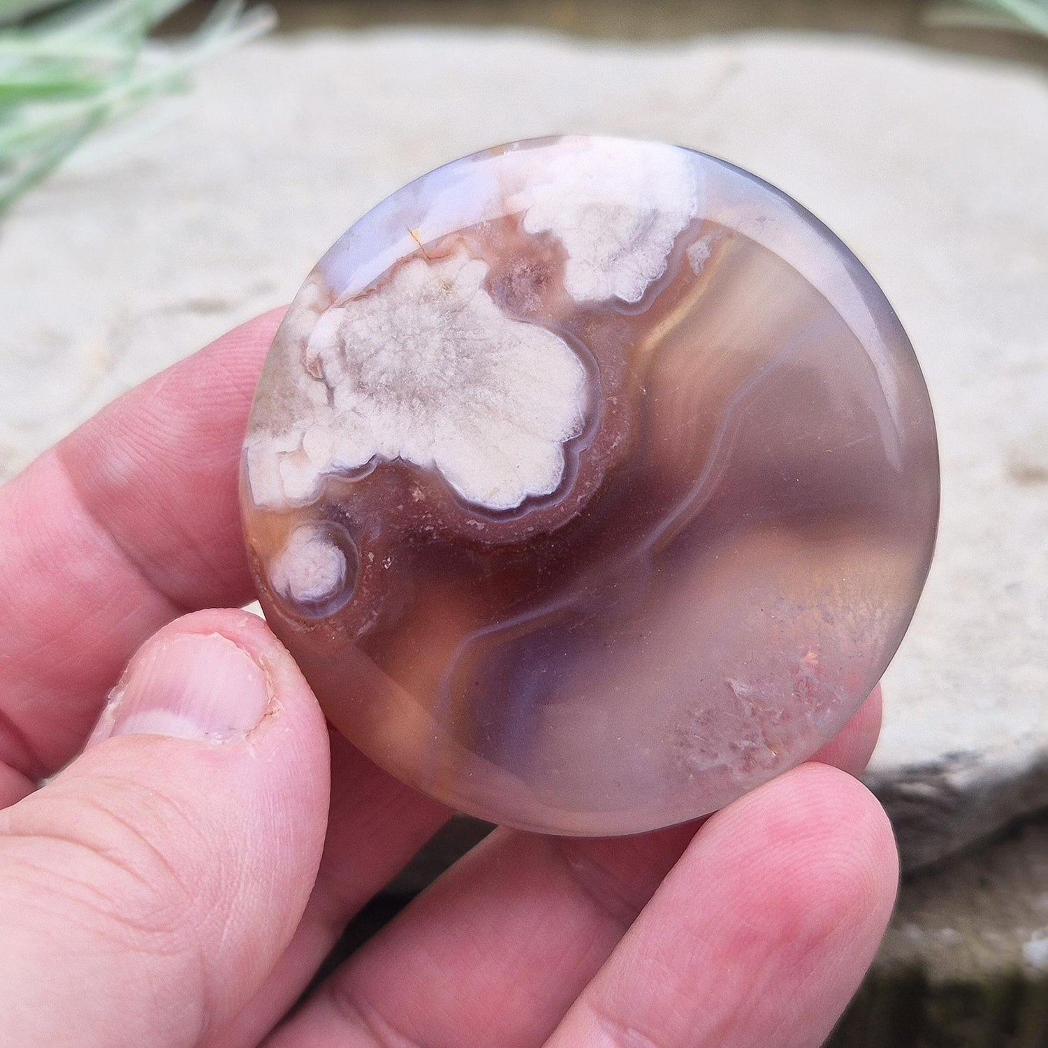 Flower Agate Crystal Palm Stone also called Cherry Blossom Agate or Blossom Agate. A beautiful variety of Pink Chalcedony from Madagascar, featuring distinctive flower-like patterns that resemble blooming blossoms.