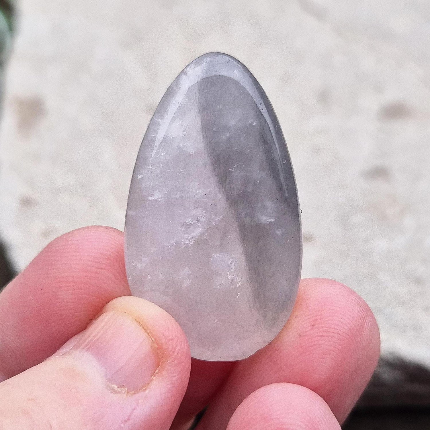 Lunar Quartz Crystal Palm Stone, also known as Lunar Rose Quartz, comes from Namibia.