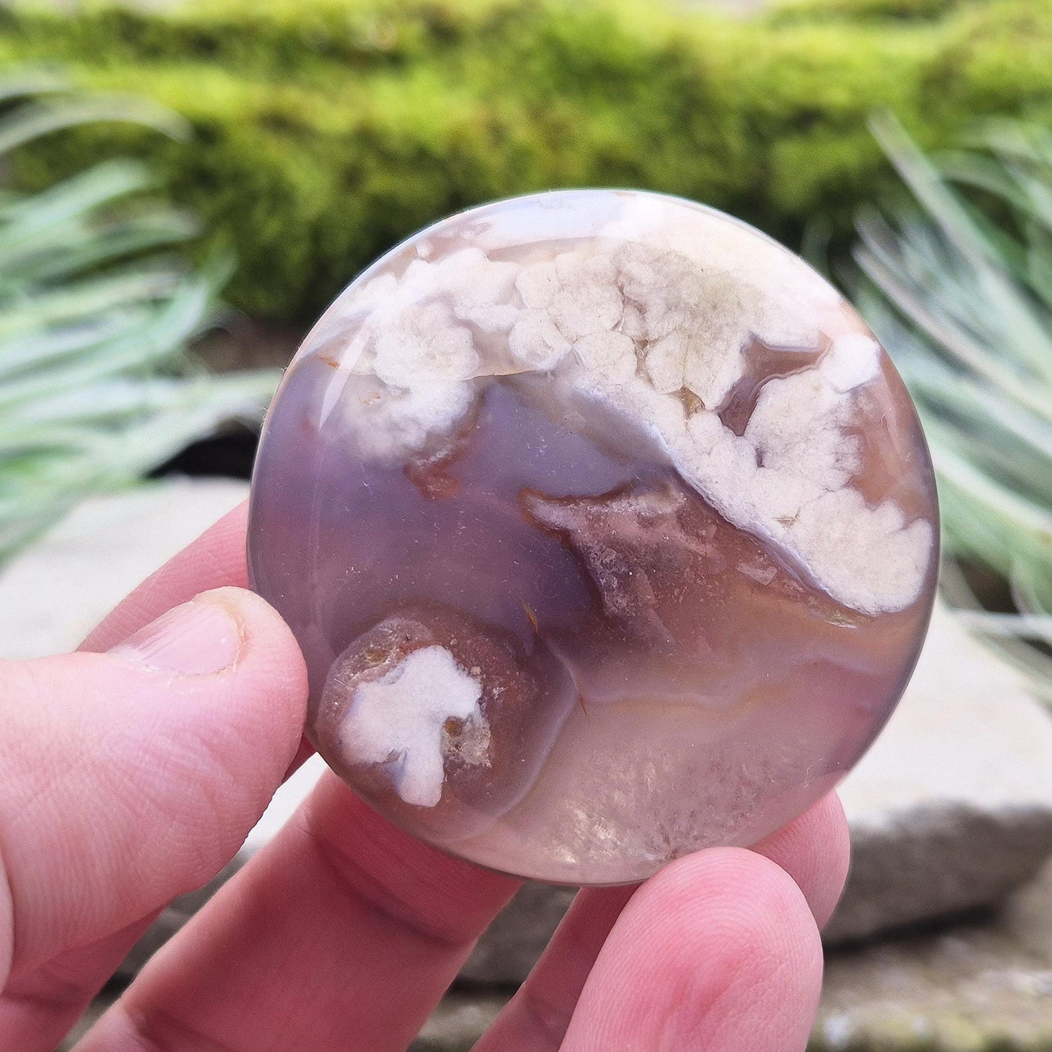 Flower Agate Crystal Palm Stone also called Cherry Blossom Agate or Blossom Agate. A beautiful variety of Pink Chalcedony from Madagascar, featuring distinctive flower-like patterns that resemble blooming blossoms.