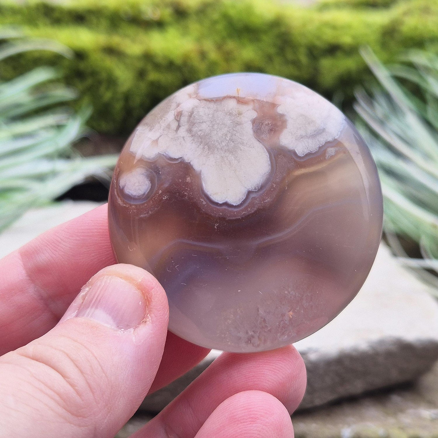 Flower Agate Crystal Palm Stone also called Cherry Blossom Agate or Blossom Agate. A beautiful variety of Pink Chalcedony from Madagascar, featuring distinctive flower-like patterns that resemble blooming blossoms.