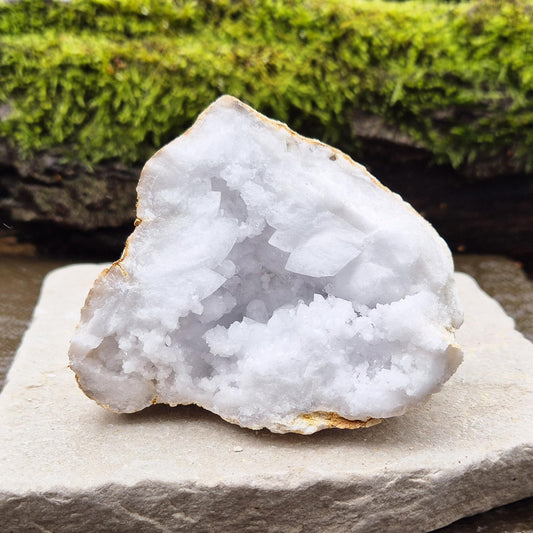 White Quartz Crystal Geode Half, from Morocco. Packed full of lovely sparkling white quartz crystal formations. 