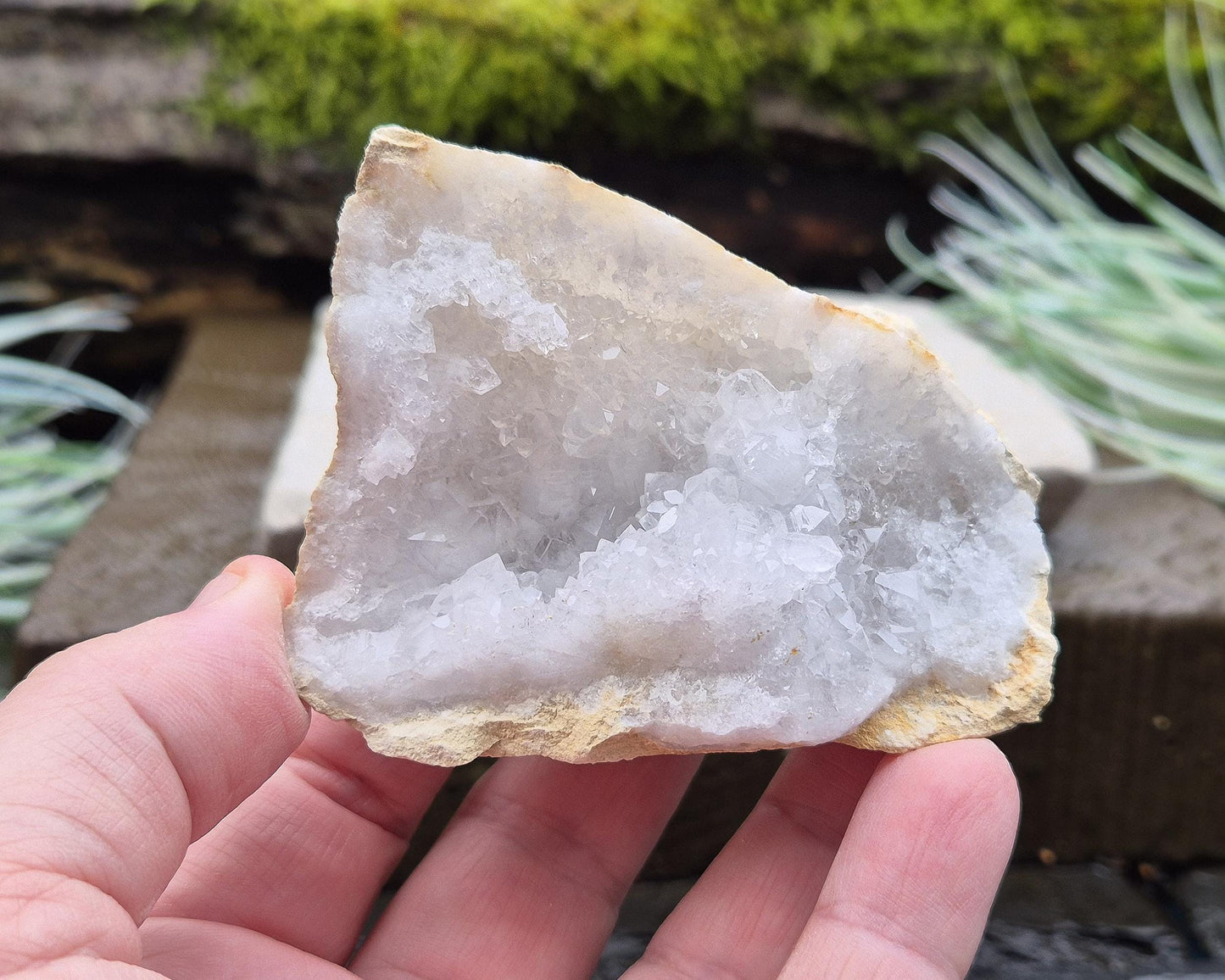 White Quartz Crystal Geode Pair, from Morocco. Lovely sparkling white quartz crystal formations in both sections of the geode. Both pieces self stand.