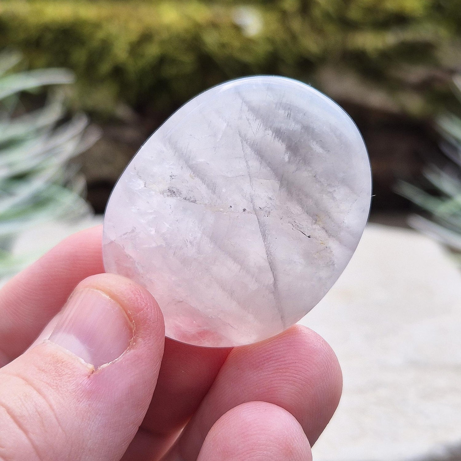 Lunar Quartz Crystal Palm Stone, also known as Lunar Rose Quartz, comes from Namibia.