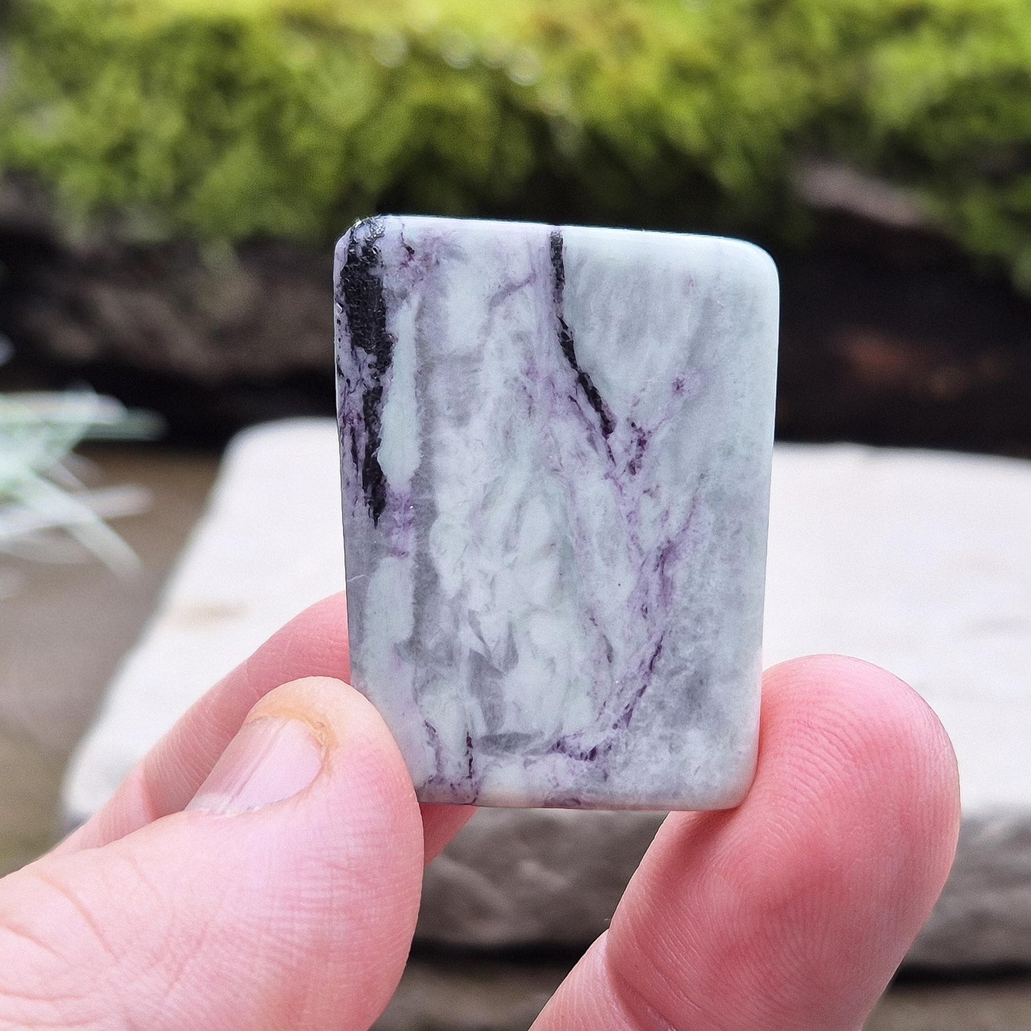 Kammererite Crystal, polished slice, is a rare crystal from Turkey. The stone is primarily purple-magenta in color, with green areas often being inclusions of Chromite, Chlorite, or Serpentine. It is sometimes also referred to as Purple Seraphinite or simply Kammerite.