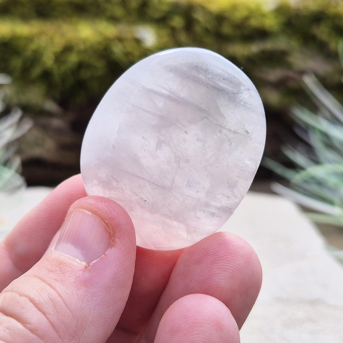 Lunar Quartz Crystal Palm Stone, also known as Lunar Rose Quartz, comes from Namibia.