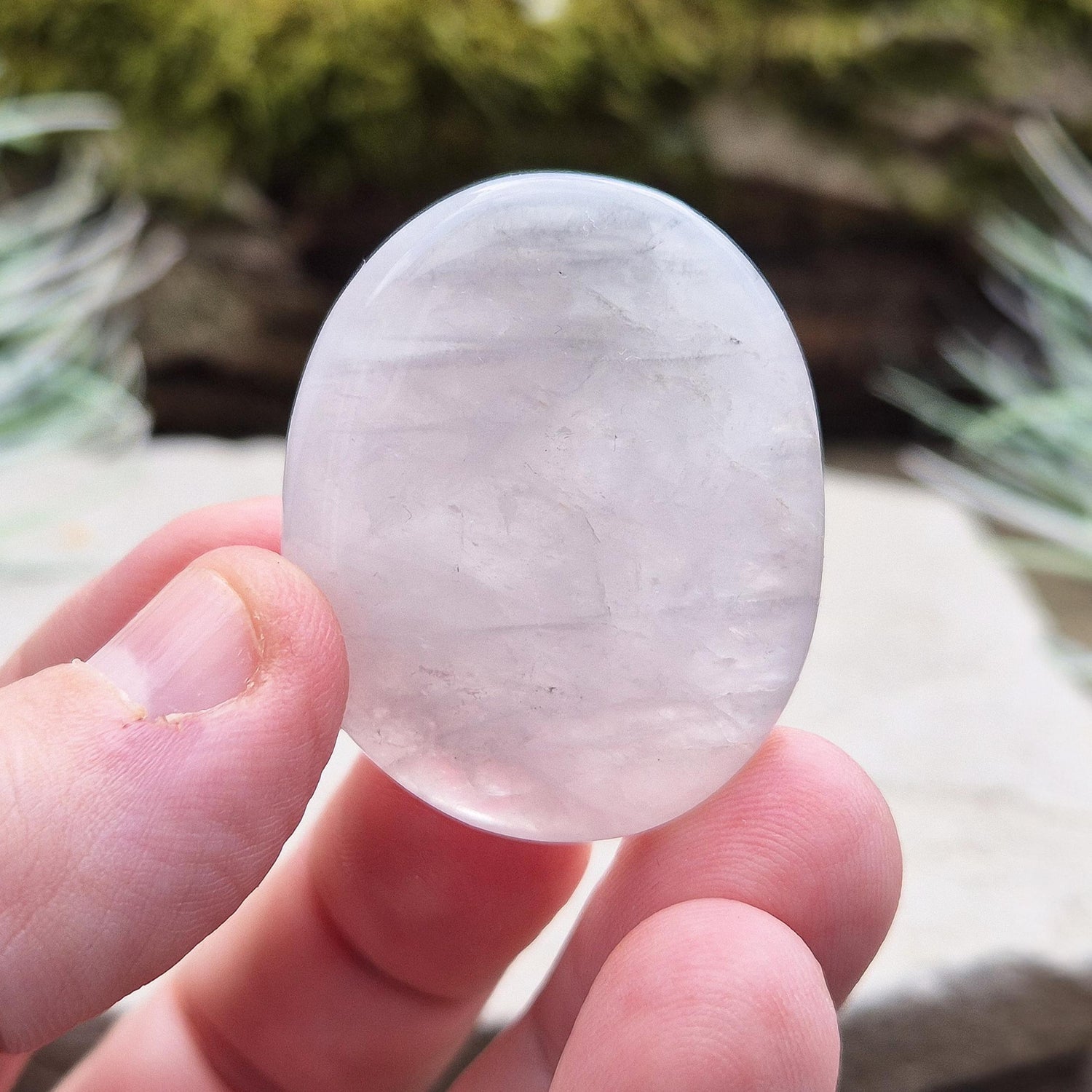 Lunar Quartz Crystal Palm Stone, also known as Lunar Rose Quartz, comes from Namibia.