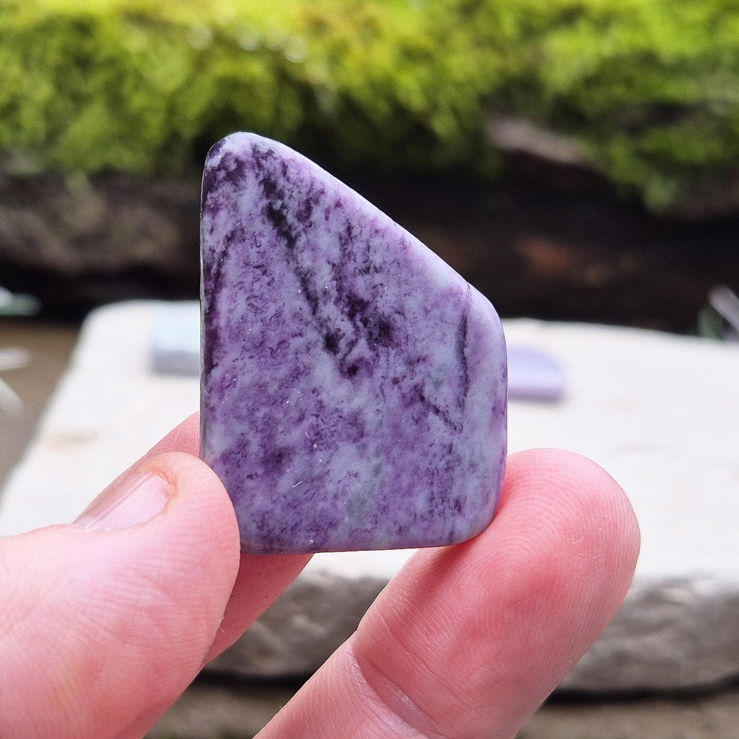 Kammererite Crystal, polished slice, is a rare crystal from Turkey. The stone is primarily purple-magenta in color, with green areas often being inclusions of Chromite, Chlorite, or Serpentine. It is sometimes also referred to as Purple Seraphinite or simply Kammerite.