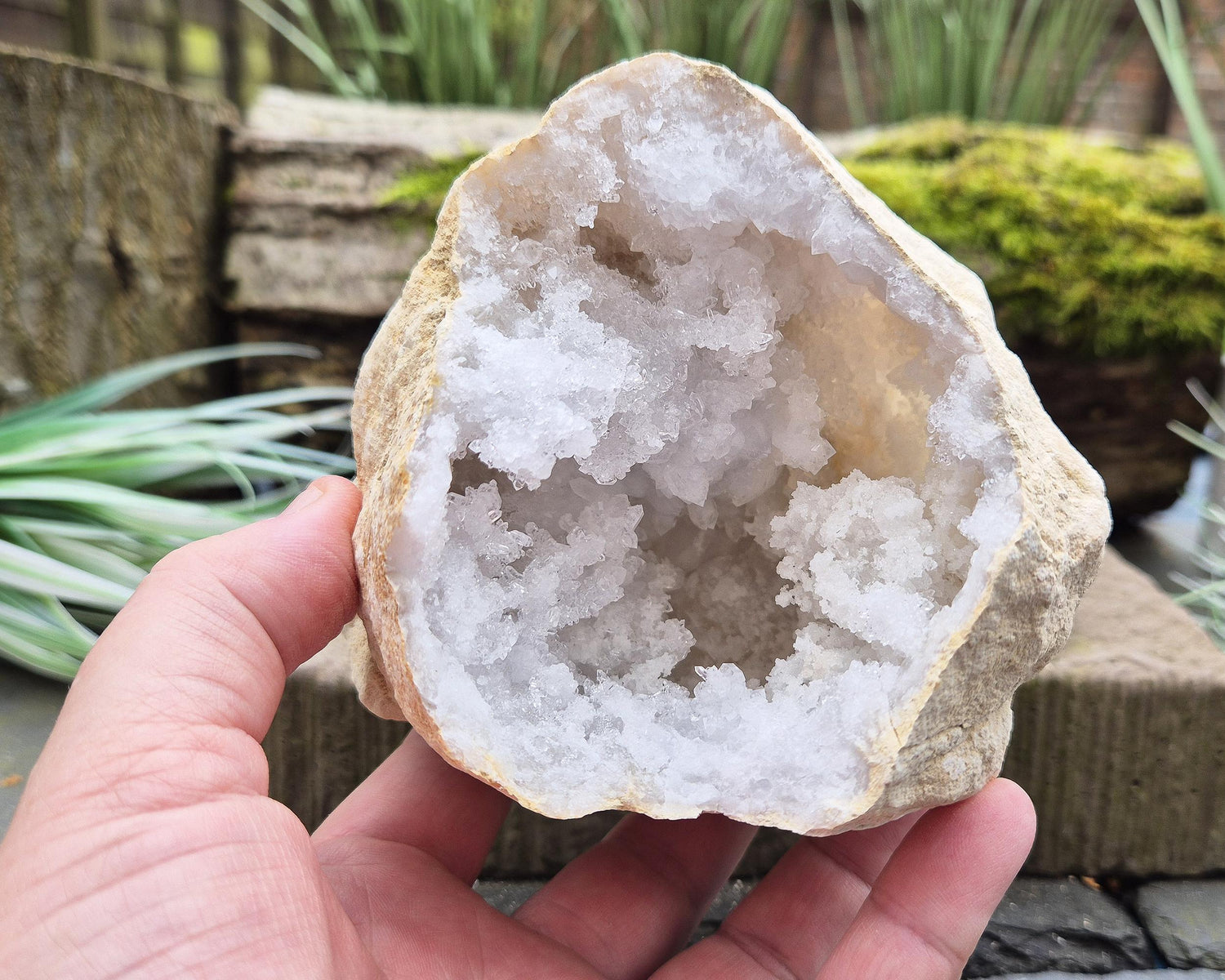 White Quartz Crystal Geode Pair, from Morocco. Lovely sparkling white quartz crystal formations in both sections of the geode. Each one can sit on a flat surface on its own.