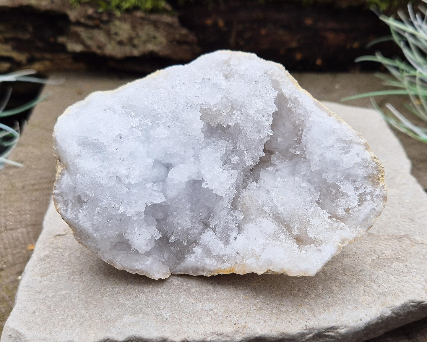 White Quartz Crystal Geode Pair, from Morocco. Lovely sparkling white quartz crystal formations in both sections of the geode. Each one can sit on a flat surface on its own.