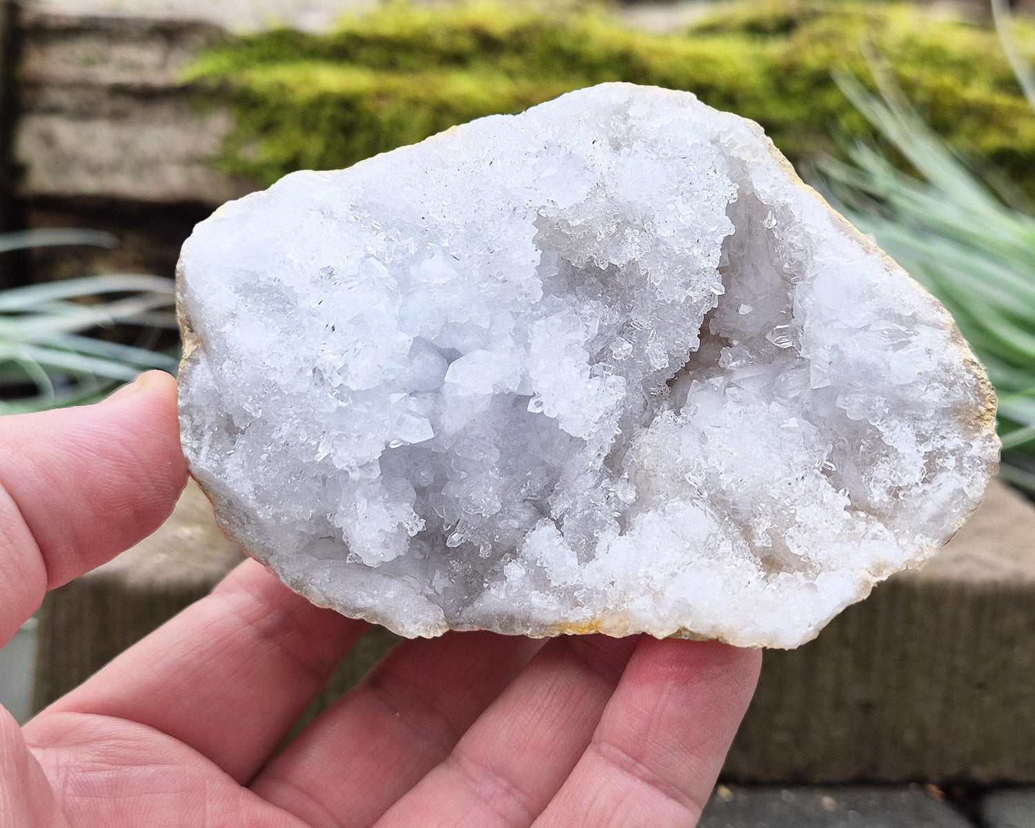 White Quartz Crystal Geode Pair, from Morocco. Lovely sparkling white quartz crystal formations in both sections of the geode. Each one can sit on a flat surface on its own.