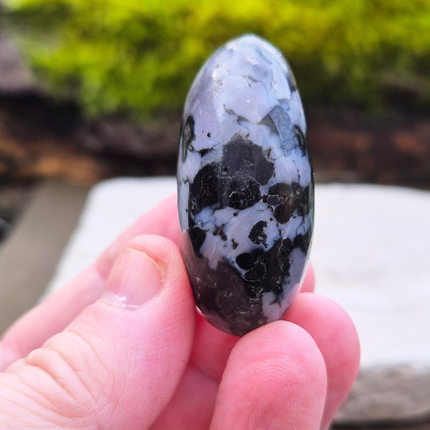 Indigo Gabbro Crystal Palm Stone, also known as Mystic Merlinite, originates from Madagascar. This a stunning stone formed deep within the Earth when molten magma cools slowly. 