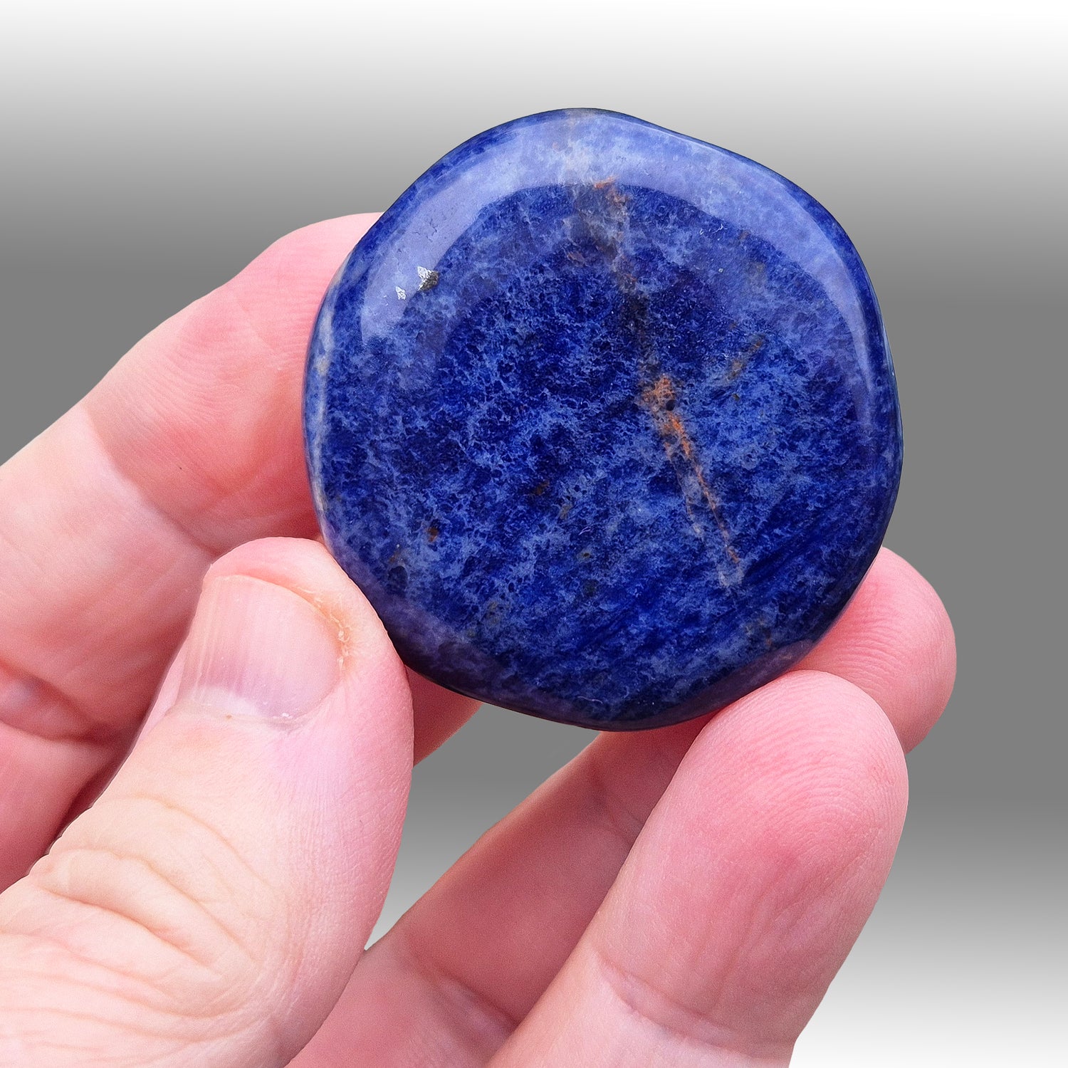 Sodalite Palm Stone. AA grade. From Namibia. Nice royal blue colouring and marking.