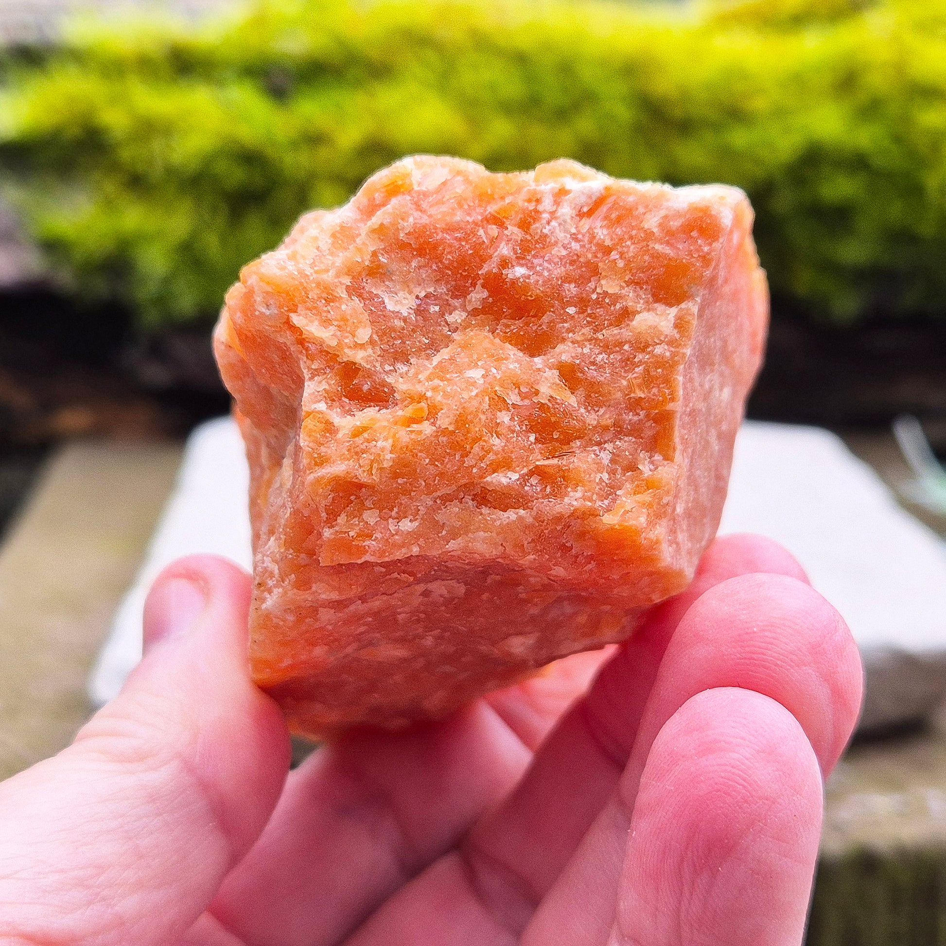 Orange Calcite, Natural Piece, Vibrant Color. While this crystal comes from a vein in the mine known for producing an infusion of orange calcite and black tourmaline, this piece appears to outwardly feature only the vibrant orange calcite.