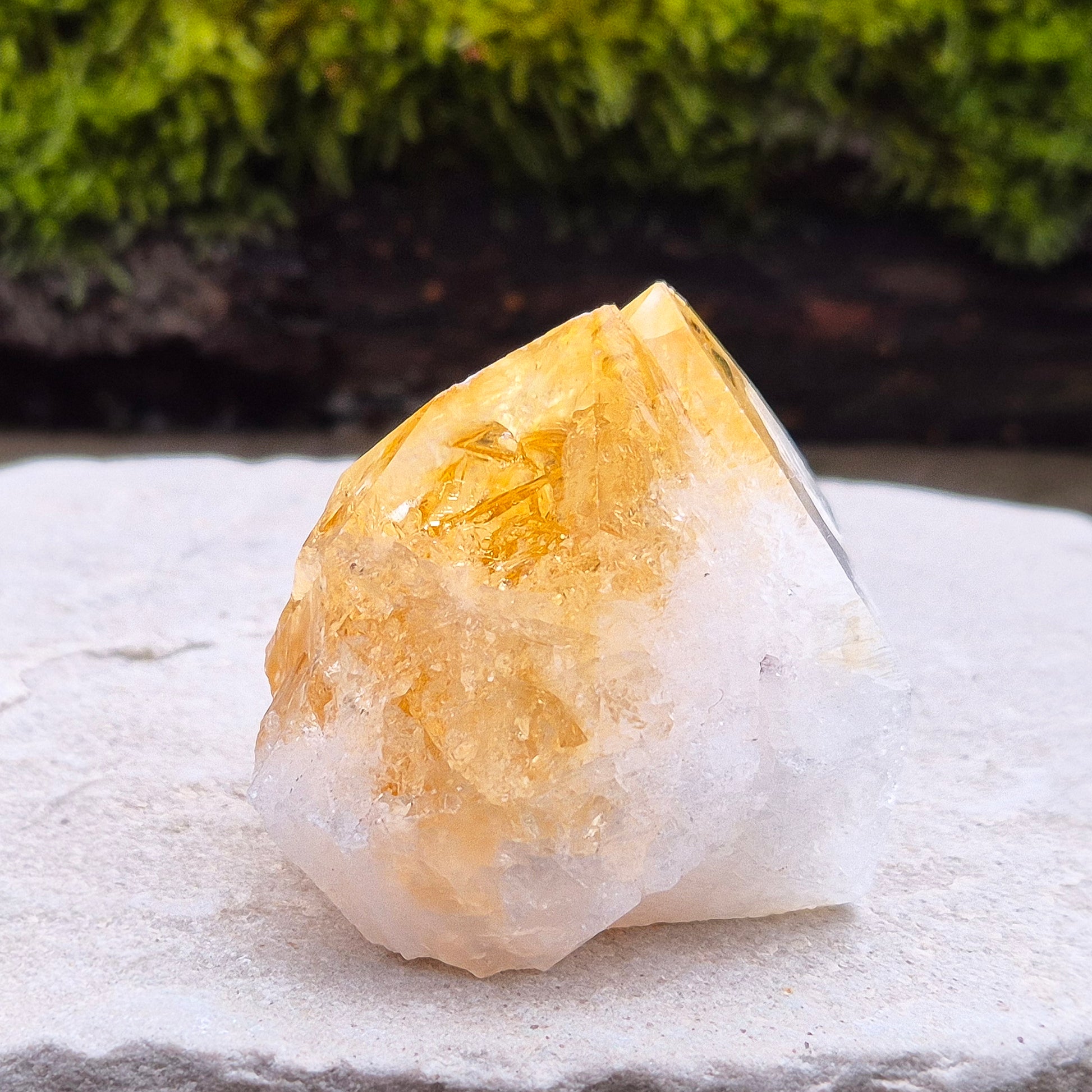 Citrine Crystal Standing Point from Brazil. Lovely pale golden colour with a double tip. Point is polished, sides are natural and the base is flat.