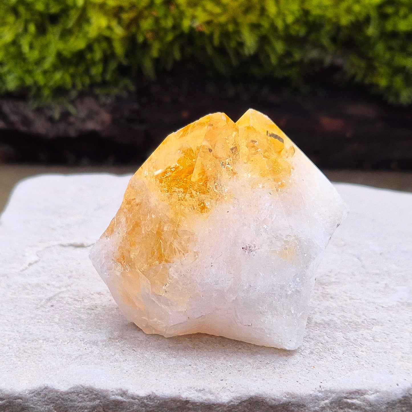 Citrine Crystal Standing Point from Brazil. Lovely pale golden colour with a double tip. Point is polished, sides are natural and the base is flat.