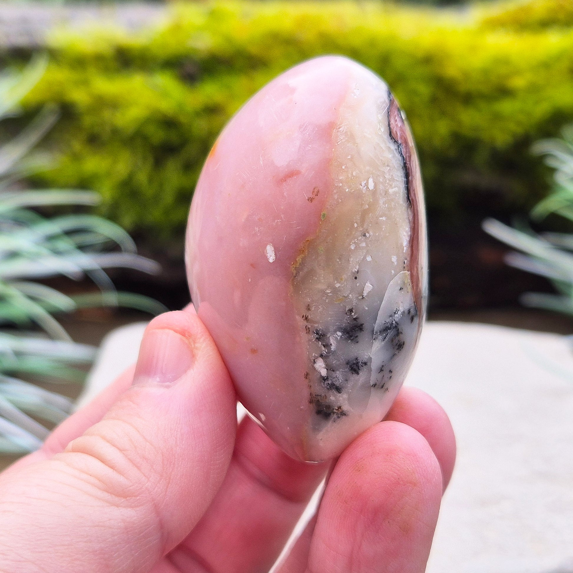 Pink Opal Crystal Heart with Dendritic inclusions, from Peru. Lovely dusky Pink colouring on one side and then on the other you can see some really lovely dendritic inclusions making this a great looking piece.