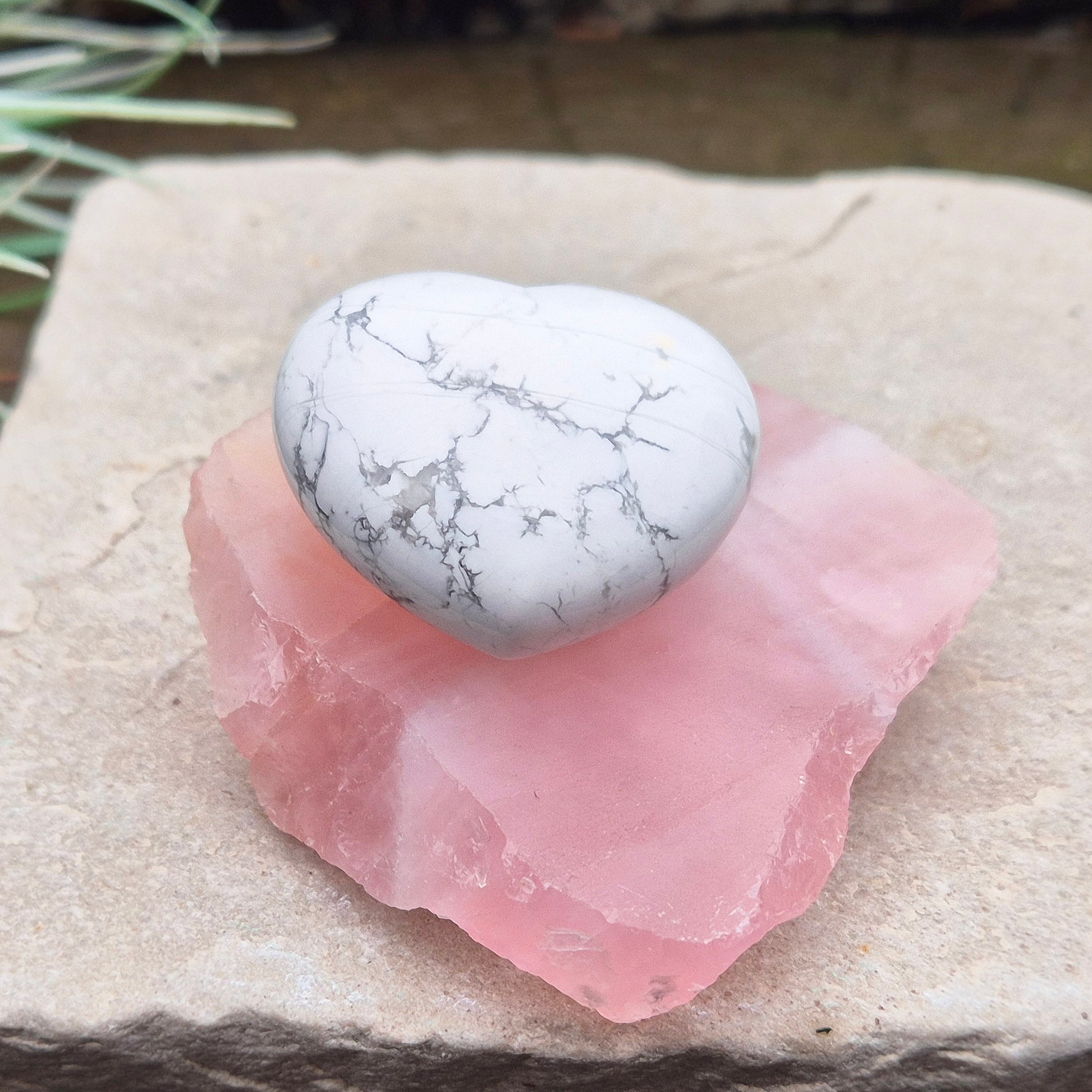 Rose Quartz Crystal Platform from South Africa. One side is left natural and the other side has been cut flat. Great for displaying other crystals and jewellry. 