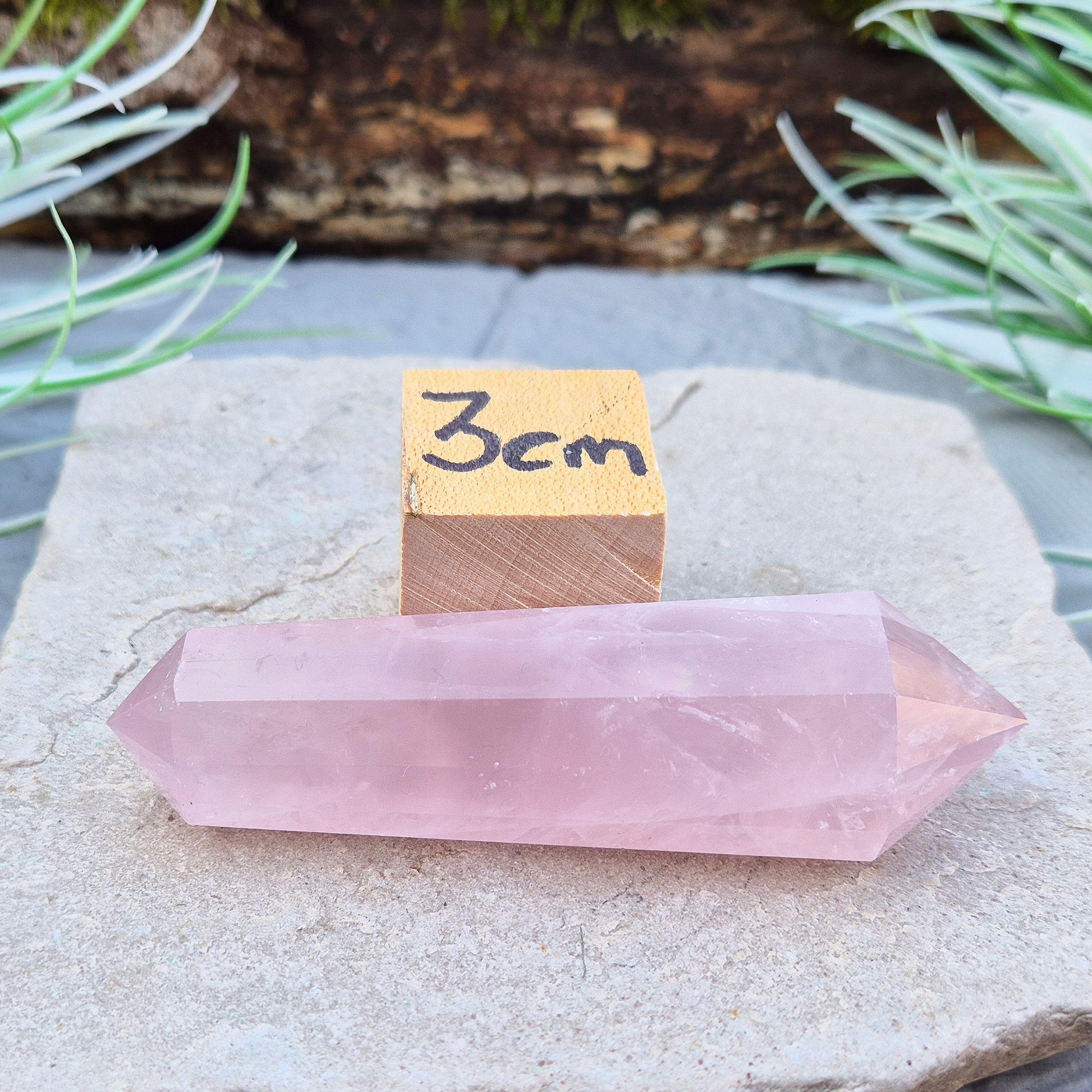 Rose Quartz Double Terminated Vogel Cut Wand from Brazil. Lovely pale pink colouring. 12 sided. One larger end, and one smaller end.