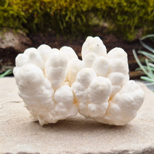 Cave Calcite, also known as Cave Popcorn or Coralloid, is actually Aragonite, not Calcite. This stunning mineral forms in caves, mines, and moist limestone-rich areas