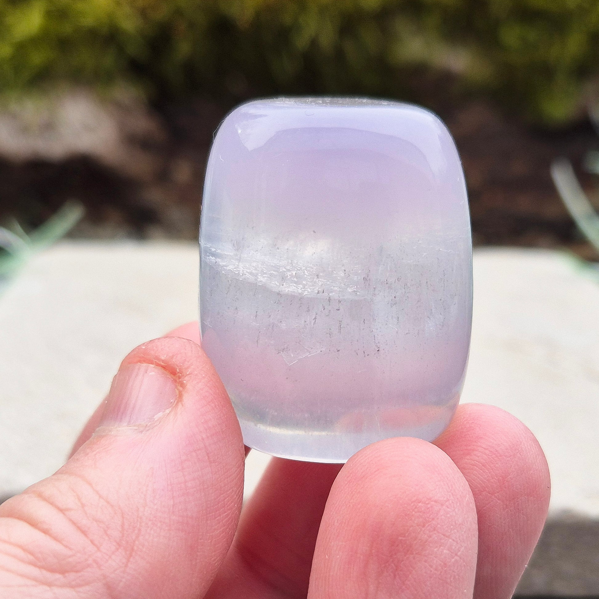 Lilac Fluorite Crystal. Lilac Fluorite also known as Lavender Fluorite is often described as a "balancing bridge" between the heart and the higher mind, offering a soothing energy that aids both emotional and spiritual harmony.