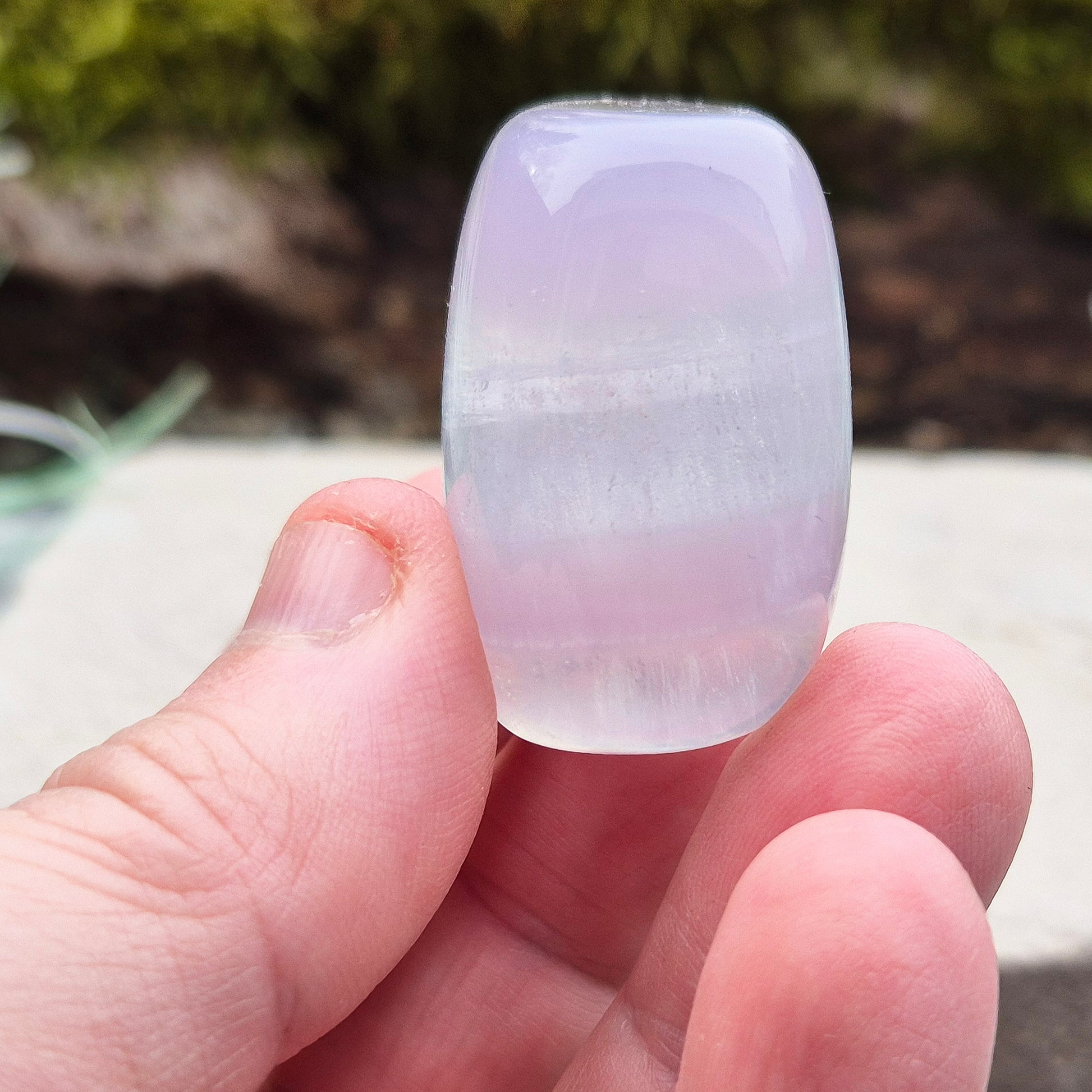 Lilac Fluorite Crystal. Lilac Fluorite also known as Lavender Fluorite is often described as a "balancing bridge" between the heart and the higher mind, offering a soothing energy that aids both emotional and spiritual harmony.