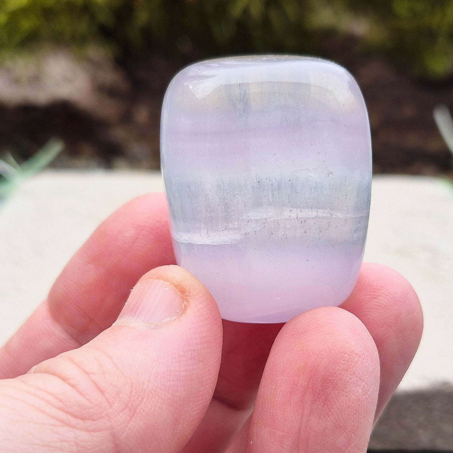 Lilac Fluorite Crystal. Lilac Fluorite also known as Lavender Fluorite is often described as a "balancing bridge" between the heart and the higher mind, offering a soothing energy that aids both emotional and spiritual harmony.