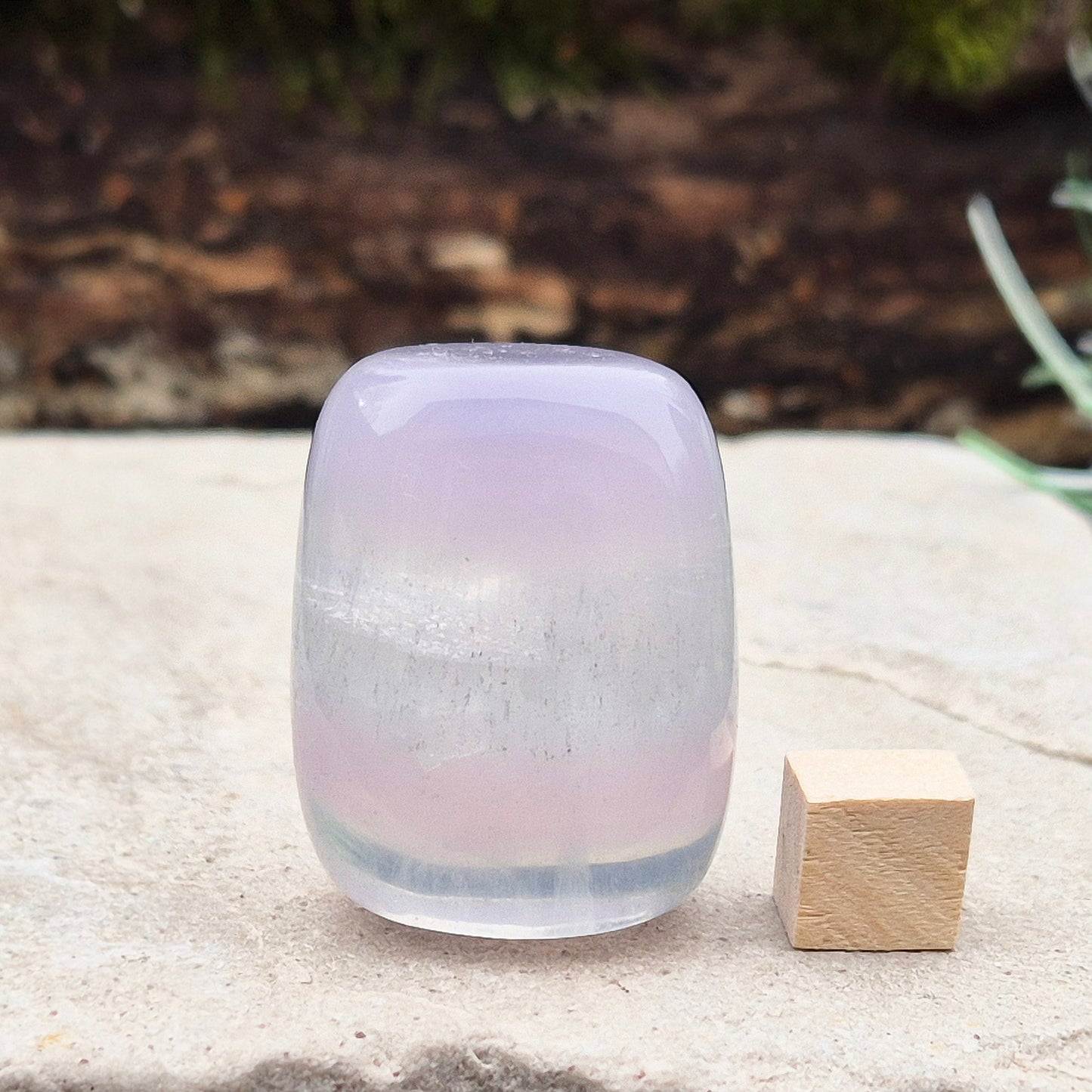 Lilac Fluorite Crystal. Lilac Fluorite also known as Lavender Fluorite is often described as a "balancing bridge" between the heart and the higher mind, offering a soothing energy that aids both emotional and spiritual harmony.