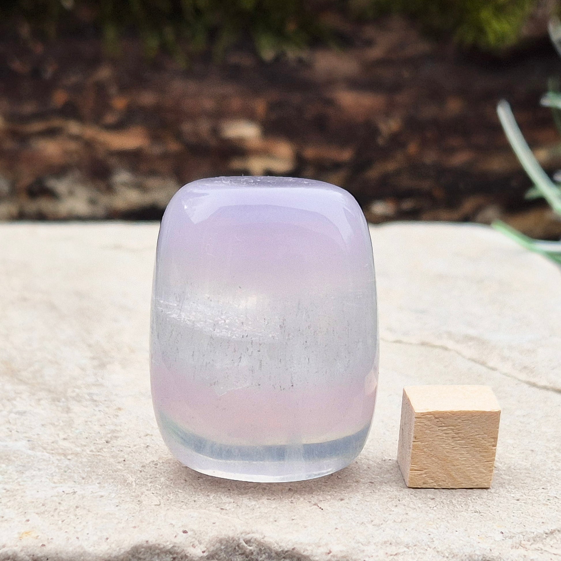 Lilac Fluorite Crystal. Lilac Fluorite also known as Lavender Fluorite is often described as a "balancing bridge" between the heart and the higher mind, offering a soothing energy that aids both emotional and spiritual harmony.