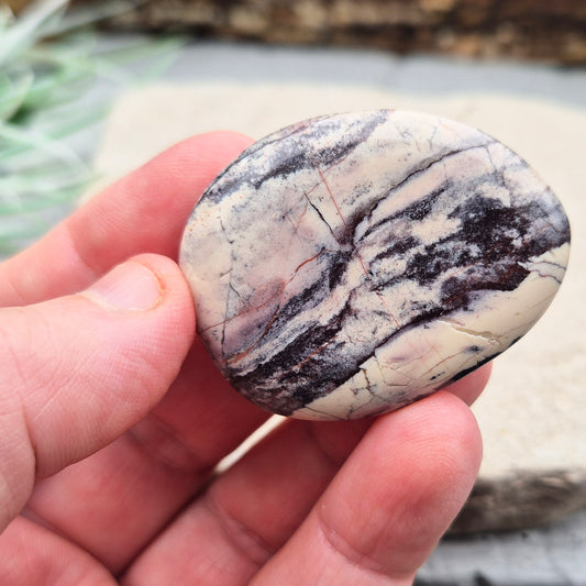 Porcelain Jasper Crystal Palm Stone, Madagascar. Sometimes known as "Exotica Jasper," is a type of jasper characterized by its striking colours and patterns. 