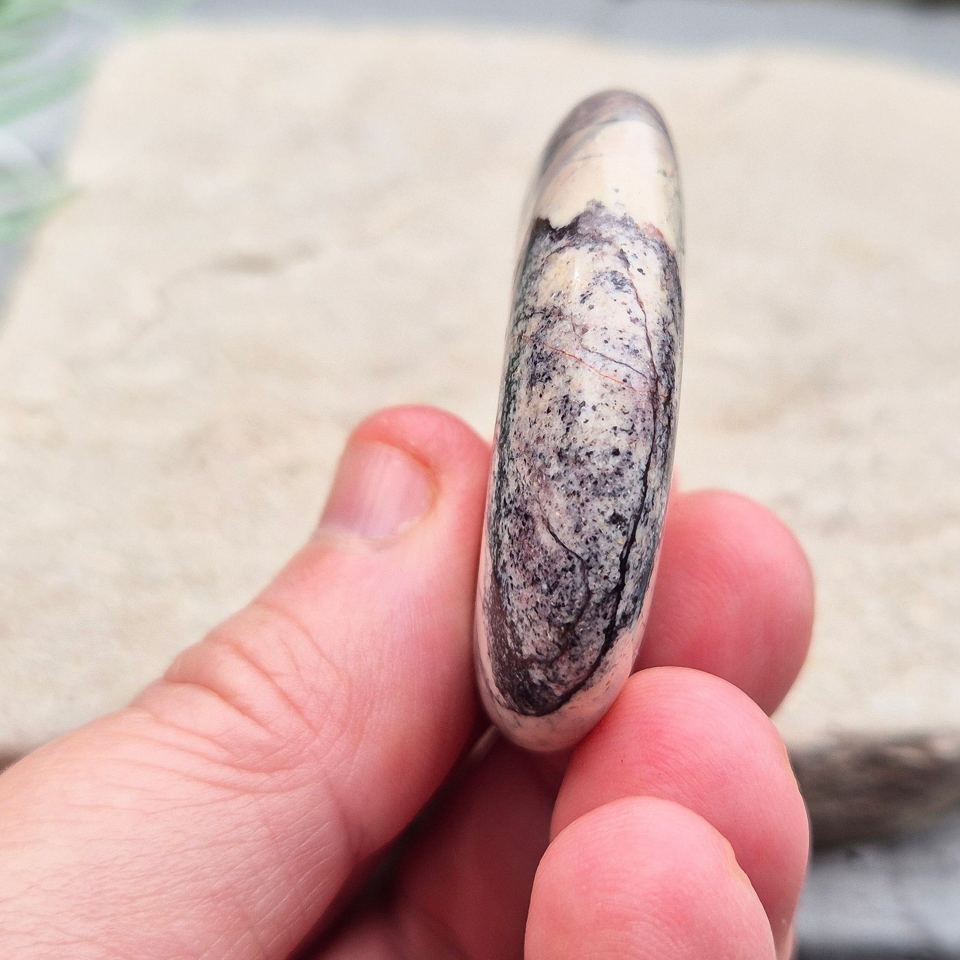 Porcelain Jasper Crystal Palm Stone, Madagascar. Sometimes known as "Exotica Jasper," is a type of jasper characterized by its striking colours and patterns. 