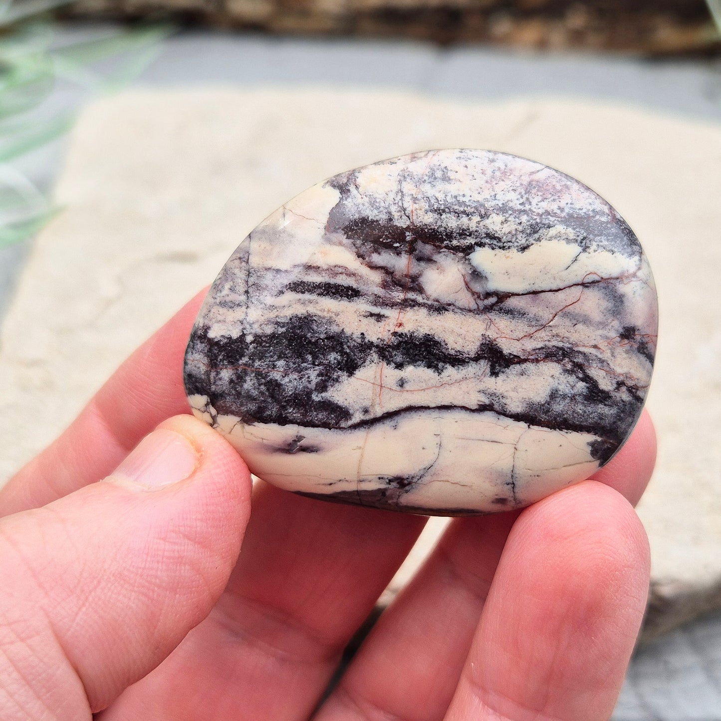 Porcelain Jasper Crystal Palm Stone, Madagascar. Sometimes known as "Exotica Jasper," is a type of jasper characterized by its striking colours and patterns. 