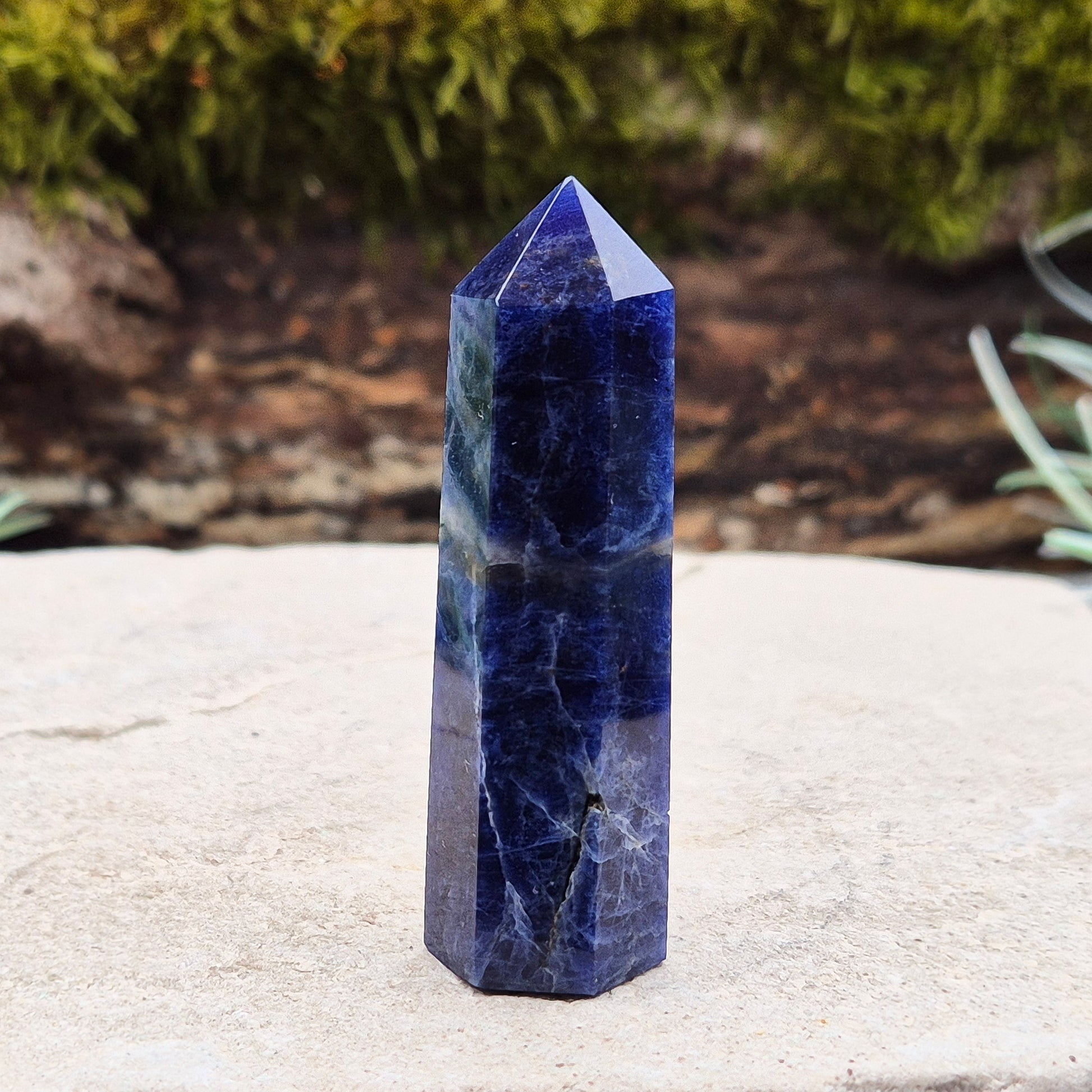 Sodalite Crystal Point. A grade. From Namibia. Nice royal blue colouring and marking. 6 sided generator tip.