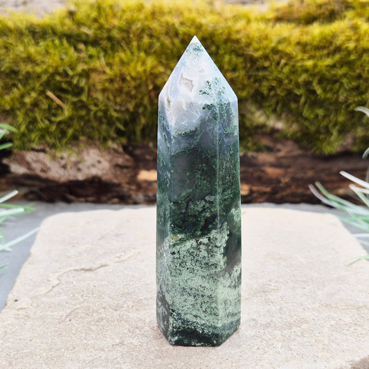 This exquisite Moss Agate Tower features a 6 sided Generator tip, polished surface with unique moss-like inclusions, creating a captivating natural design. 