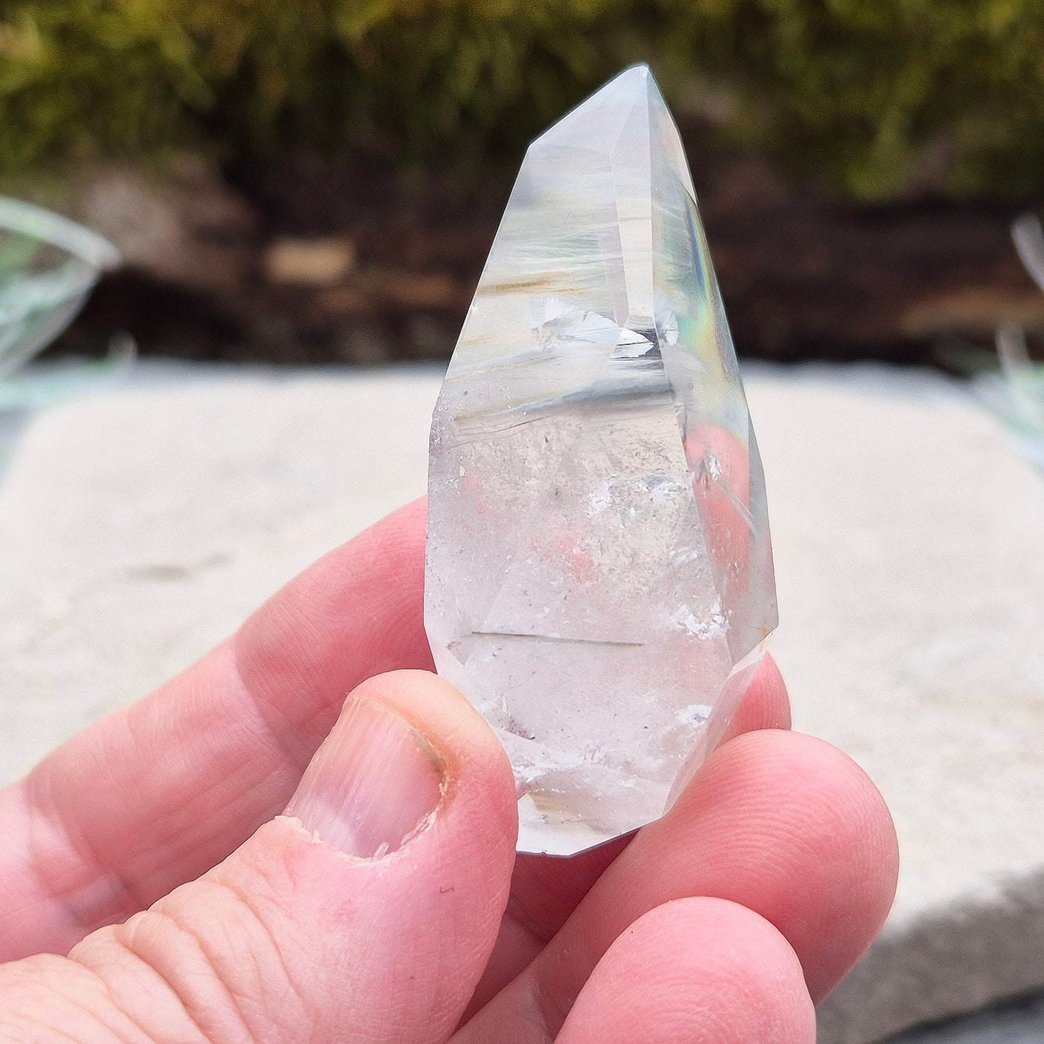 Blue Tara, also known as Indicolite Quartz, is a rare and captivating crystal featuring natural Blue Tourmaline inclusions within Quartz. This rare crystal combination-featuring fine blue needles to misty, cloud-like patterns