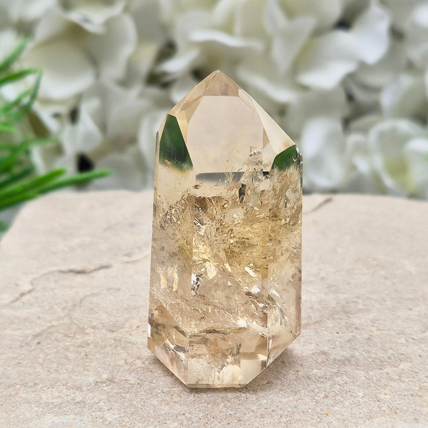 Natural Untreated polished Citrine Point sourced and polished in Brazil. Wonderful light citrine colour with great light reflecting inclusions. Finding natural citrine is becoming more difficult so I am delighted to have this piece.