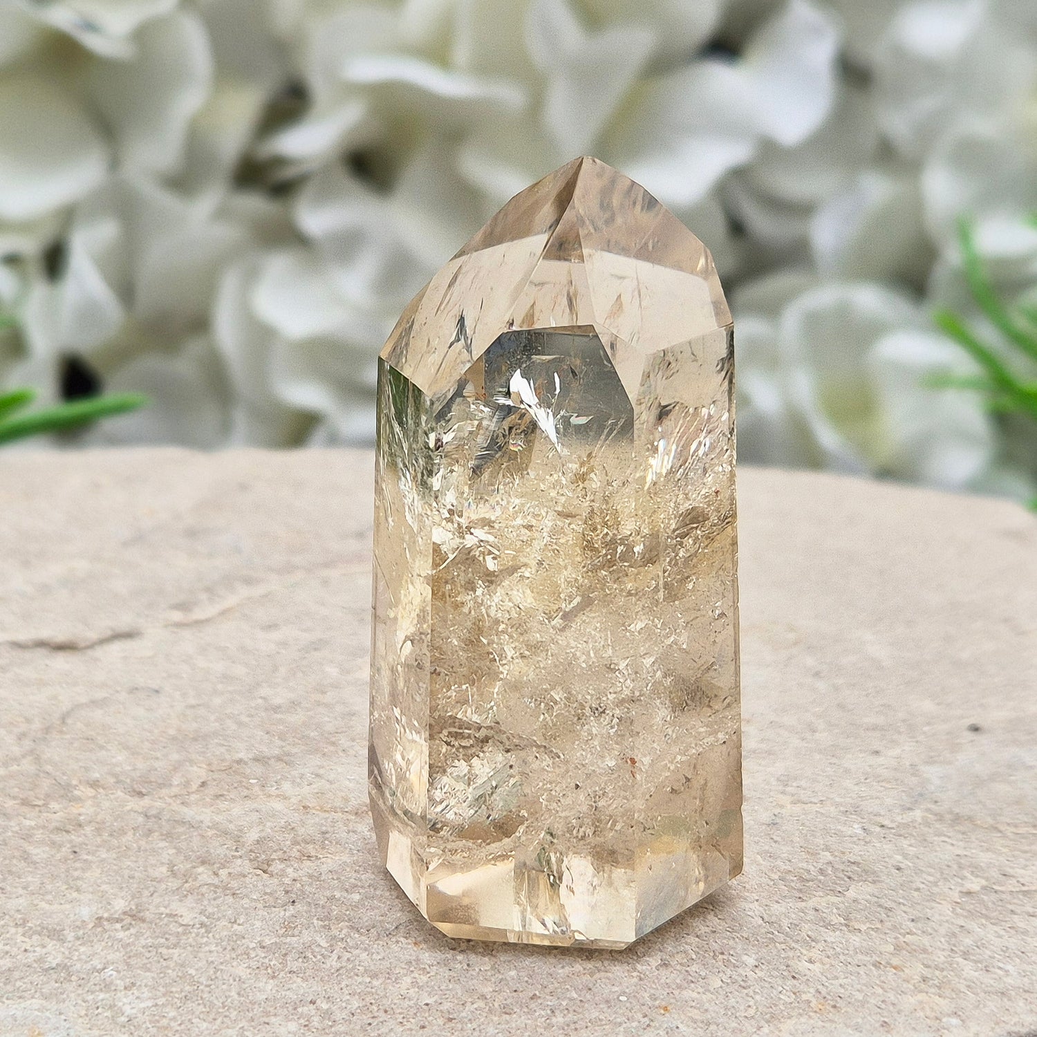 Natural Untreated polished Citrine Point sourced and polished in Brazil. Wonderful light citrine colour with great light reflecting inclusions. Finding natural citrine is becoming more difficult so I am delighted to have this piece.