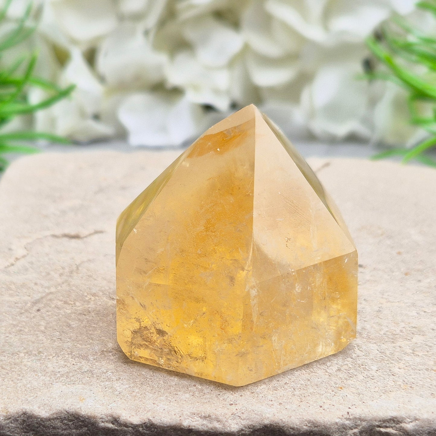 Natural Untreated polished Citrine Point sourced and polished in Brazil. Wonderful birght gold citrine colour with light reflecting inclusions and a raiunbow on the front face. 