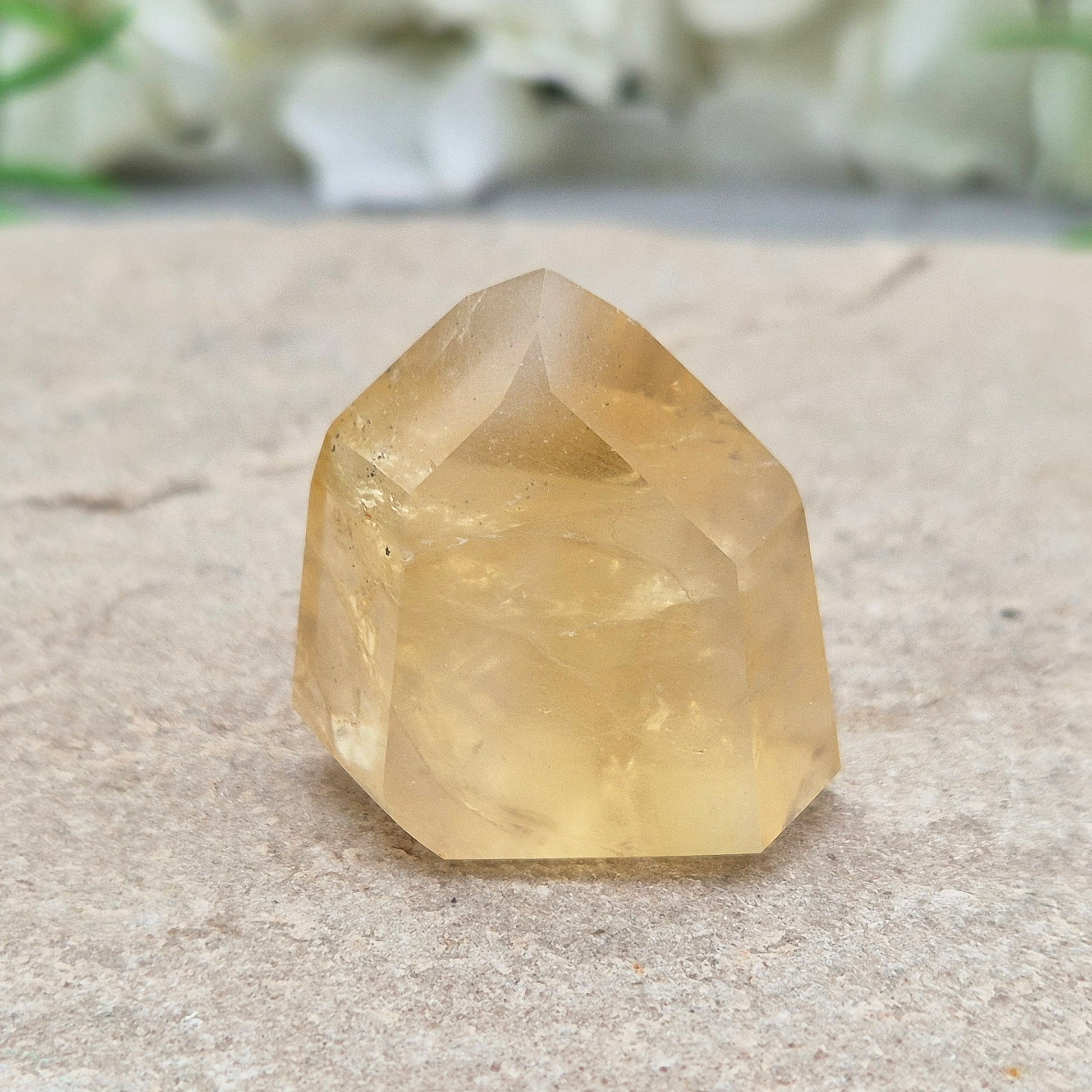 Genuine natural citrine crystal point, polished and sourced from Brazil. Ideal for crystal lovers, display, or mindful gifting.

